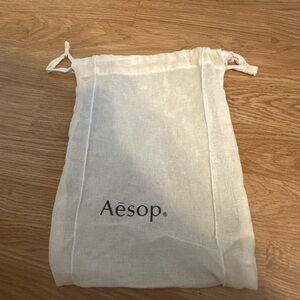 AESOP COTTON MESH DRAWSTRING BAG
